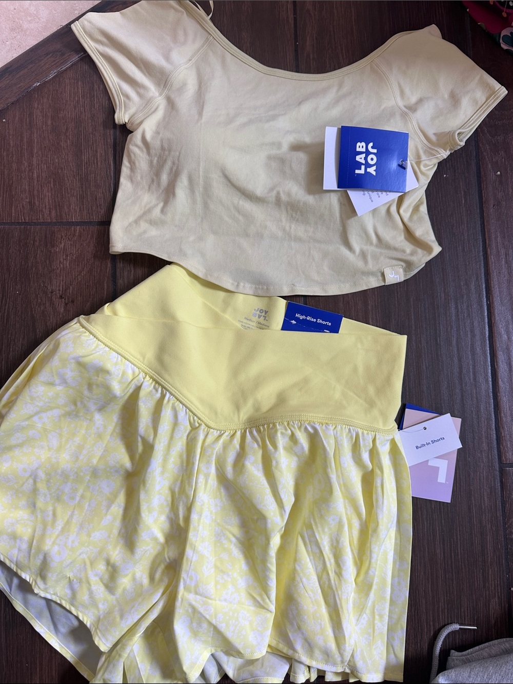 JoyLab Yellow High-Rise Athletic Shorts with Floral Skirt Overlay and crop top